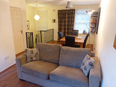 Living room (with double sofabed) and dining area